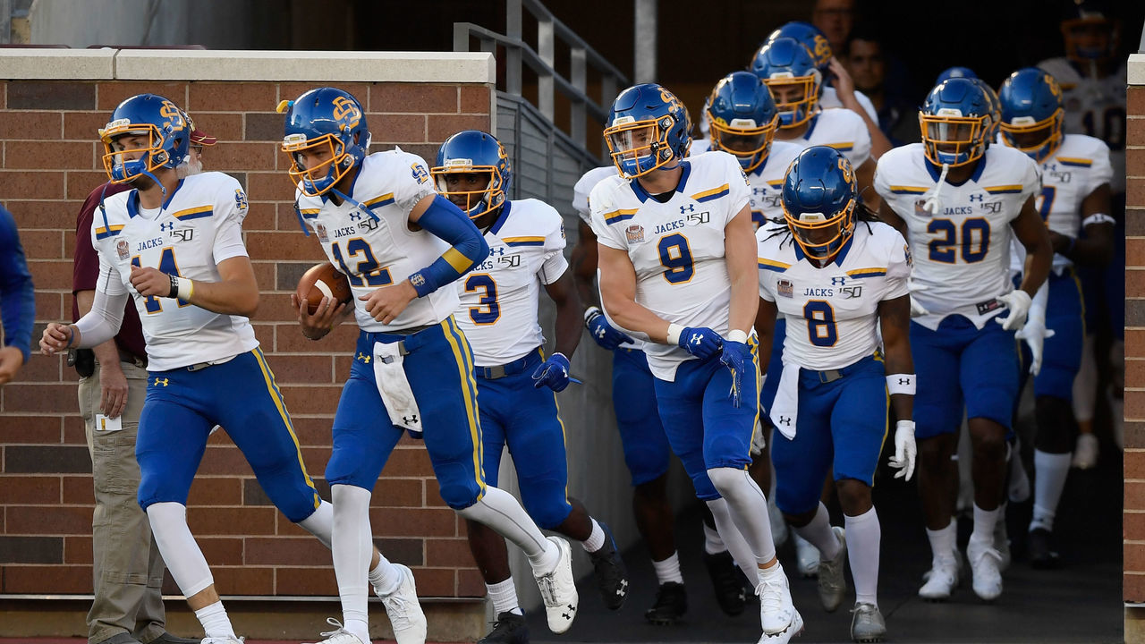 MINNEAPOLIS, MN - AUGUST 29: The South Dakota State Jackrabbits run onto the field to warm up before the game against the Minnesota Gophers on August 29, 2018 at TCF Bank Stadium in Minneapolis, Minnesota.