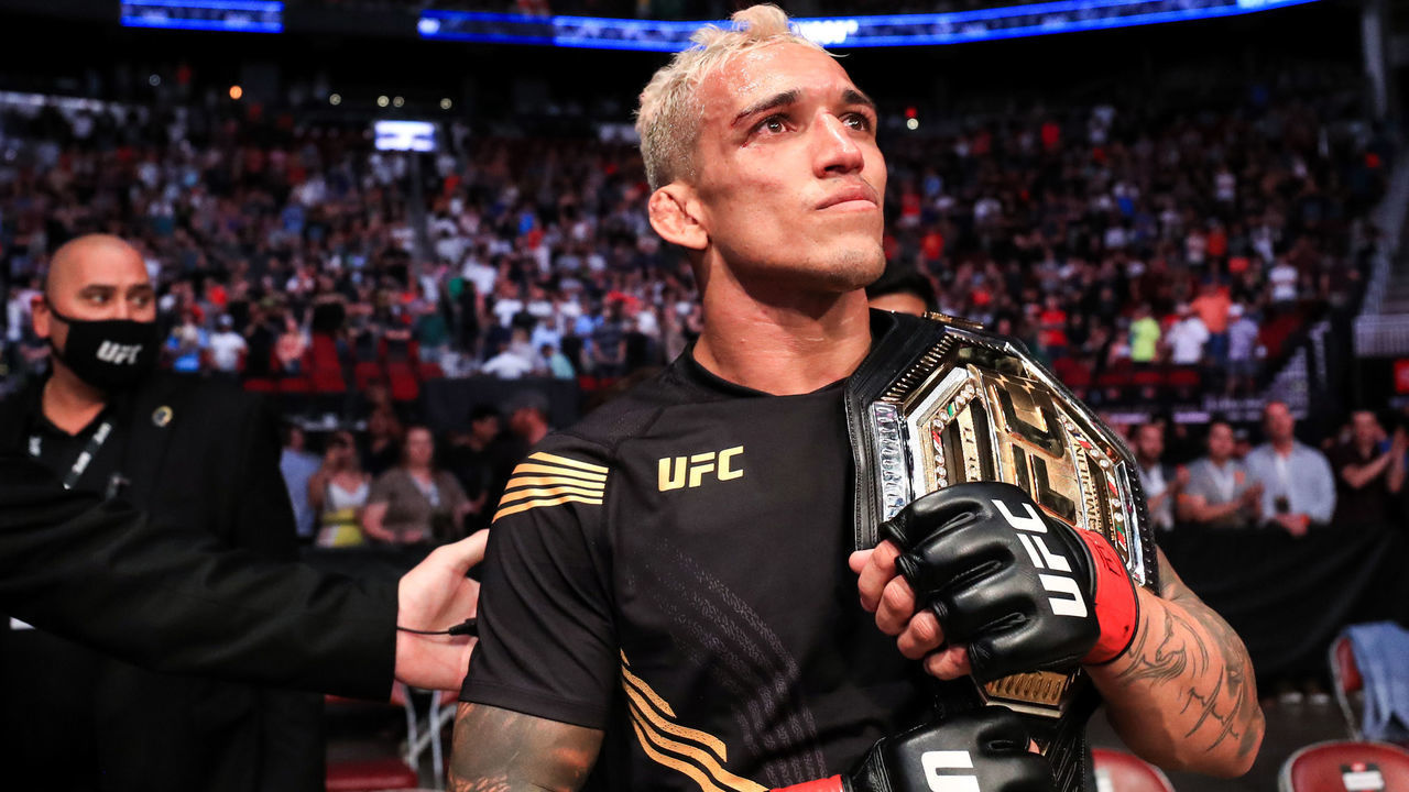 HOUSTON, TEXAS - MAY 15: Charles Oliveira celebrates defeating Michael Chandler during their Championship Lightweight Bout of UFC 262 at Toyota Center on May 15, 2021 in Houston, Texas.
