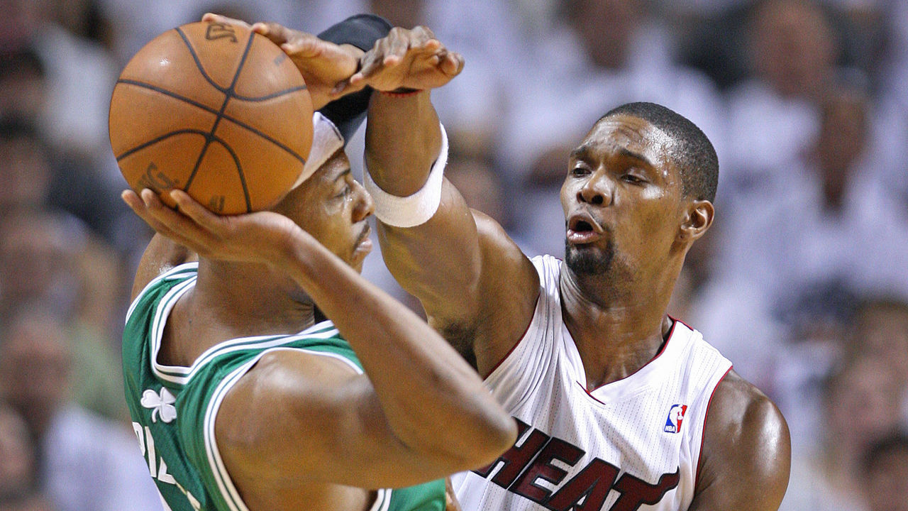 MIAMI, FL - JUNE 5: Miami's Chris Bosh, right, playing in his first game of the series as he comes back from an injury defends versus the Celtics Paul Pierce in the first quarter. The Boston Celtics visited the Miami Heat for game five of the NBA Eastern Conference Finals at American Airlines Arena.