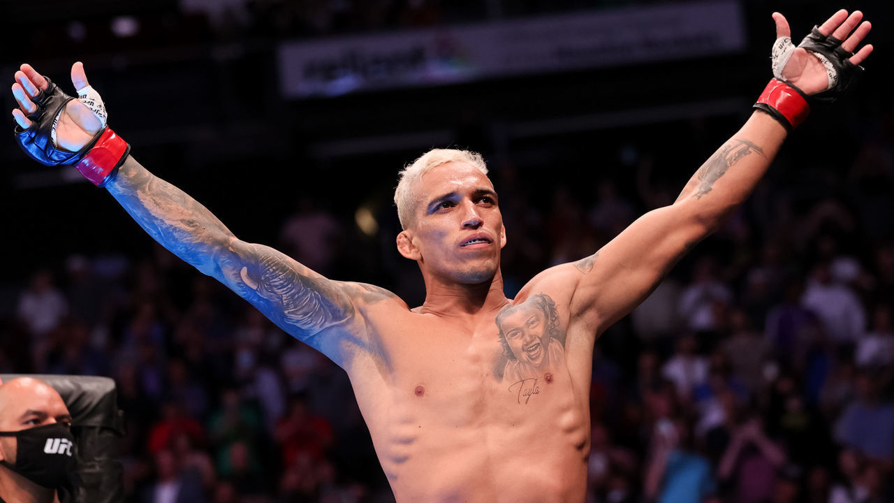HOUSTON, TEXAS - MAY 15:Charles Oliveira of Brazil gestures to the crowd before facing Michael Chandler during their Championship Lightweight Bout at the UFC 262 event at Toyota Center on May 15, 2021 in Houston, Texas.
