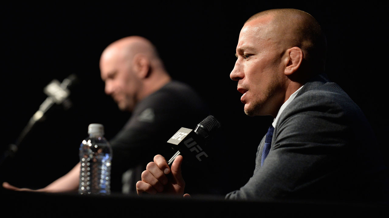 LAS VEGAS, NV - MARCH 03: UFC President Dana White watches as Georges St-Pierre speaks to the media during the UFC press conference at T-Mobile arena on March 3, 2017 in Las Vegas, Nevada.