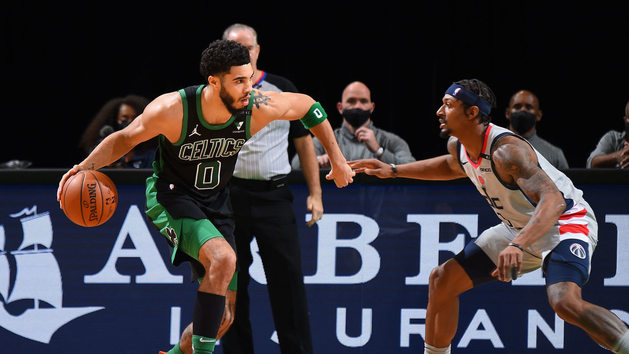 BOSTON, MA - FEBRUARY 28: Bradley Beal #3 of the Washington Wizards plays defense on Jayson Tatum #0 of the Boston Celtics during the game on February 28, 2021 at the TD Garden in Boston, Massachusetts. Mandatory Copyright Notice: Copyright 2021 NBAE