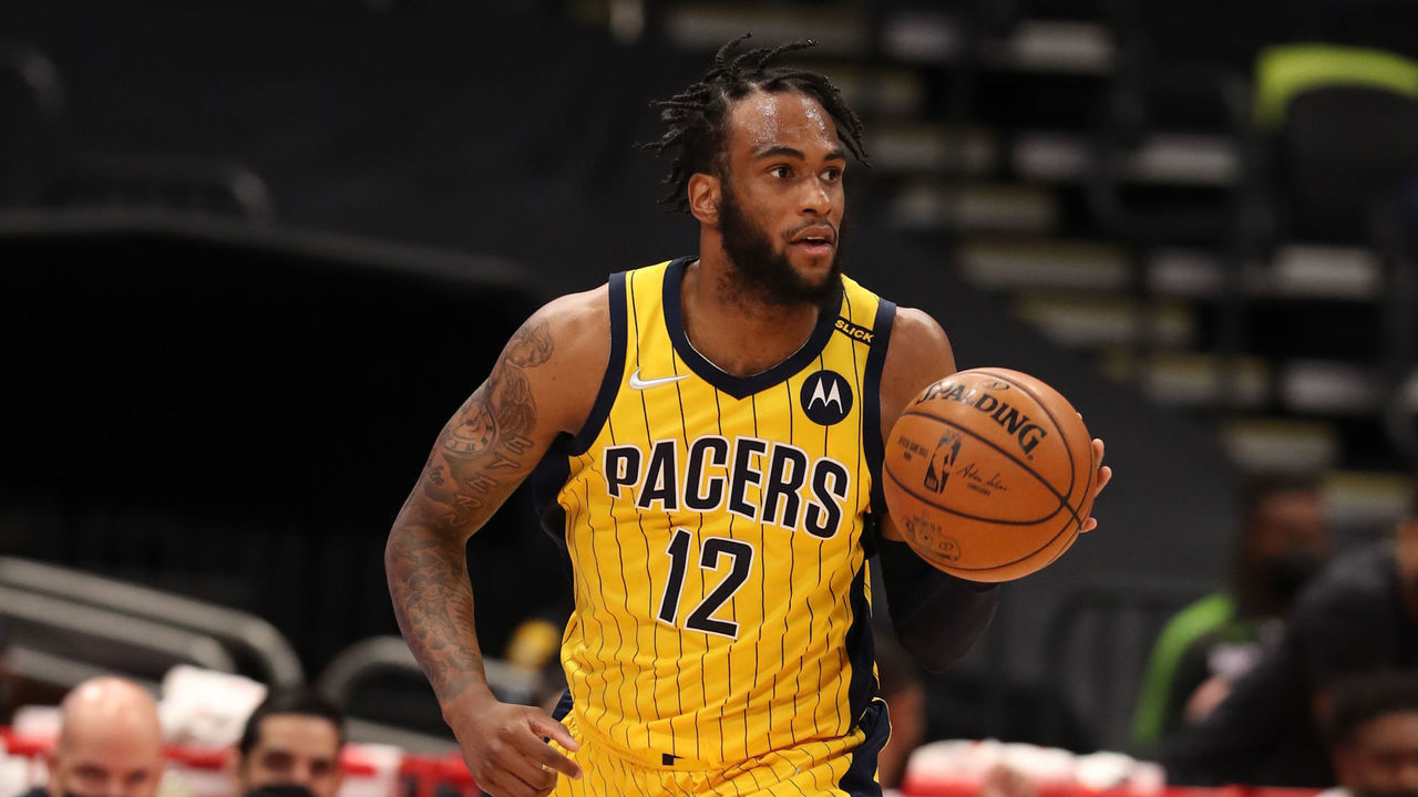 TAMPA, FL- MAY 16: Oshae Brissett #12 of the Indiana Pacers drives to the basket during the game against the Toronto Raptors on May 16, 2021 at Amalie Arena in Tampa, Florida. Mandatory Copyright Notice: Copyright 2021 NBAE