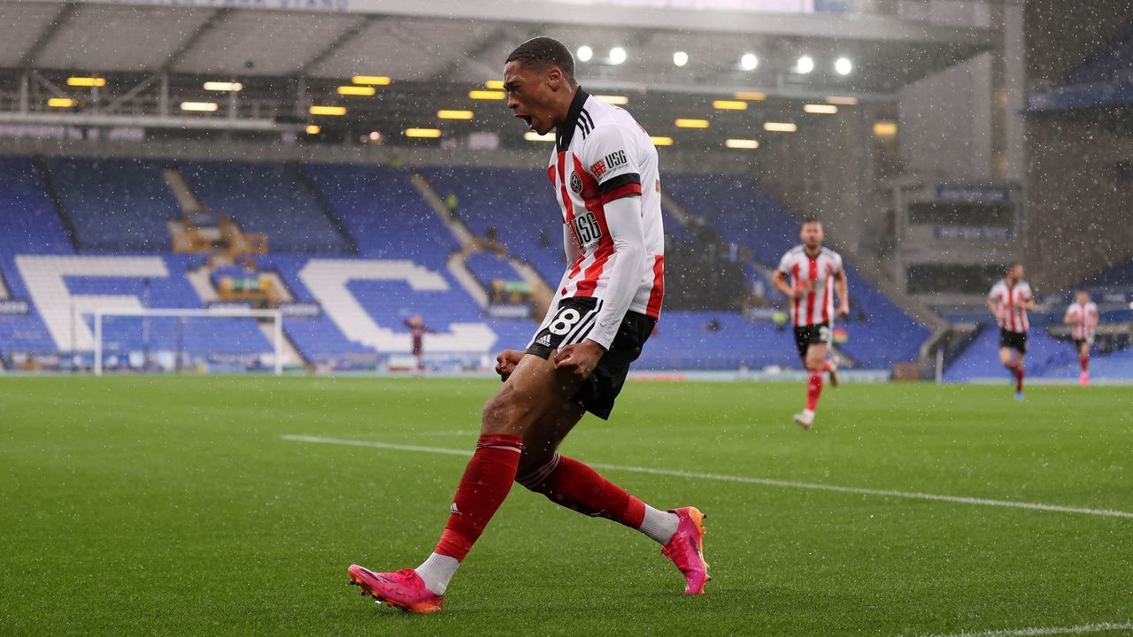 Sheffield United's striker Daniel Jebbison celebrates scoring his team's first goal during the English Premier League football match between Everton and Sheffield United at Goodison Park in Liverpool, north west England on May 16, 2021. - RESTRICTED TO EDITORIAL USE. No use with unauthorized audio, video, data, fixture lists, club/league logos or 'live' services. Online in-match use limited to 120 images. An additional 40 images may be used in extra time. No video emulation. Social media in-match use limited to 120 images. An additional 40 images may be used in extra time. No use in betting publications, games or single club/league/player publications.