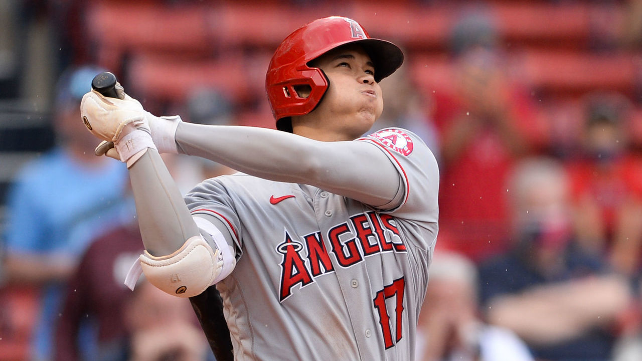 BOSTON, MA - MAY 16: Shohei Ohtani #17 of the Los Angeles Angels hits a game-winning two-run home run in the ninth inning against the Boston Red Sox at Fenway Park on May 16, 2021 in Boston, Massachusetts.