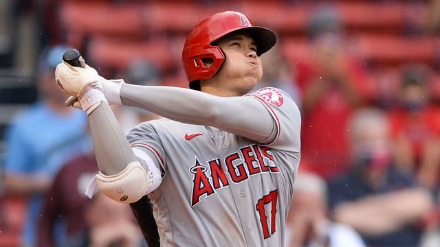BOSTON, MA - MAY 16: Shohei Ohtani #17 of the Los Angeles Angels hits a game-winning two-run home run in the ninth inning against the Boston Red Sox at Fenway Park on May 16, 2021 in Boston, Massachusetts.