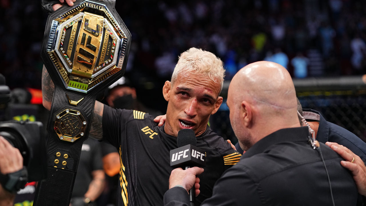 HOUSTON, TEXAS - MAY 15: Charles Oliveira of Brazil is interviewed after defeating Michael Chandler in their UFC lightweight championship bout at Toyota Center on May 15, 2021 in Houston, Texas.