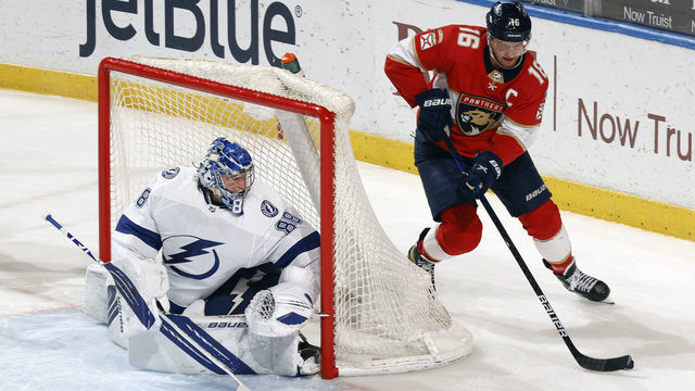 SUNRISE, FL - MAY 10: Goaltender Andrei Vasilevskiy #88 of the Tampa Bay Lightning guards the post as Aleksander Barkov #16 skates with the puck of the Florida Panthers at the BB&T Center on May 10, 2021 in Sunrise, Florida.