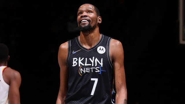 BROOKLYN, NY - MAY 16: Kevin Durant #7 of the Brooklyn Nets looks on and smiles during the game against the Cleveland Cavaliers on May 16, 2021 at Barclays Center in Brooklyn, New York. Mandatory Copyright Notice: Copyright 2021 NBAE
