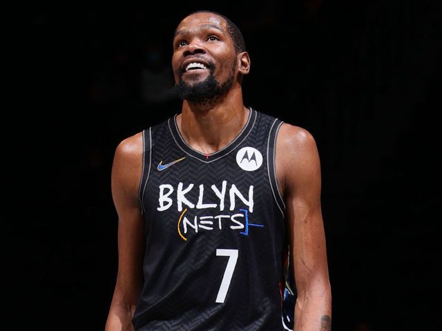 BROOKLYN, NY - MAY 16: Kevin Durant #7 of the Brooklyn Nets looks on and smiles during the game against the Cleveland Cavaliers on May 16, 2021 at Barclays Center in Brooklyn, New York. Mandatory Copyright Notice: Copyright 2021 NBAE