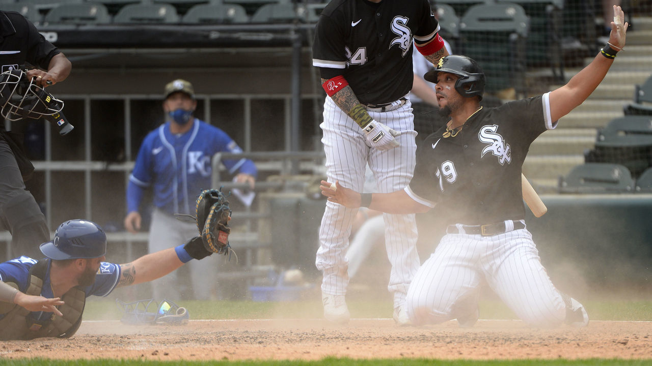 CHICAGO - MAY 16: Jose Abreu #79 of the Chicago White Sox reacts after scoring the winning run on a wild pitch by Wade Davis #71 of the Kansas City Royals in the bottom of the ninth inning on May 16, 2021 at Guaranteed Rate Field in Chicago, Illinois. Instant Replay later confirmed the call.