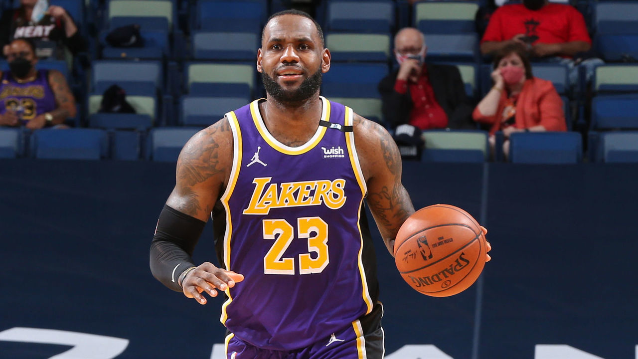 NEW ORLEANS, LA - MAY 16: LeBron James #23 of the Los Angeles Lakers smiles and dribbles the ball against the New Orleans Pelicans on May 16, 2021 at the Smoothie King Center in New Orleans, Louisiana. Mandatory Copyright Notice: Copyright 2021 NBAE