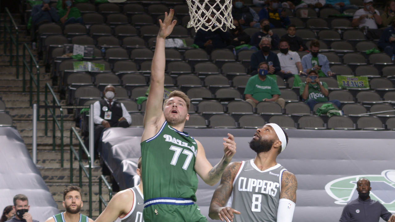 DALLAS, TX - MARCH 17: Luka Doncic #77 of the Dallas Mavericks shoots the ball during the game against the LA Clippers on March 17, 2021 at the American Airlines Center in Dallas, Texas. Mandatory Copyright Notice: Copyright 2021 NBAE