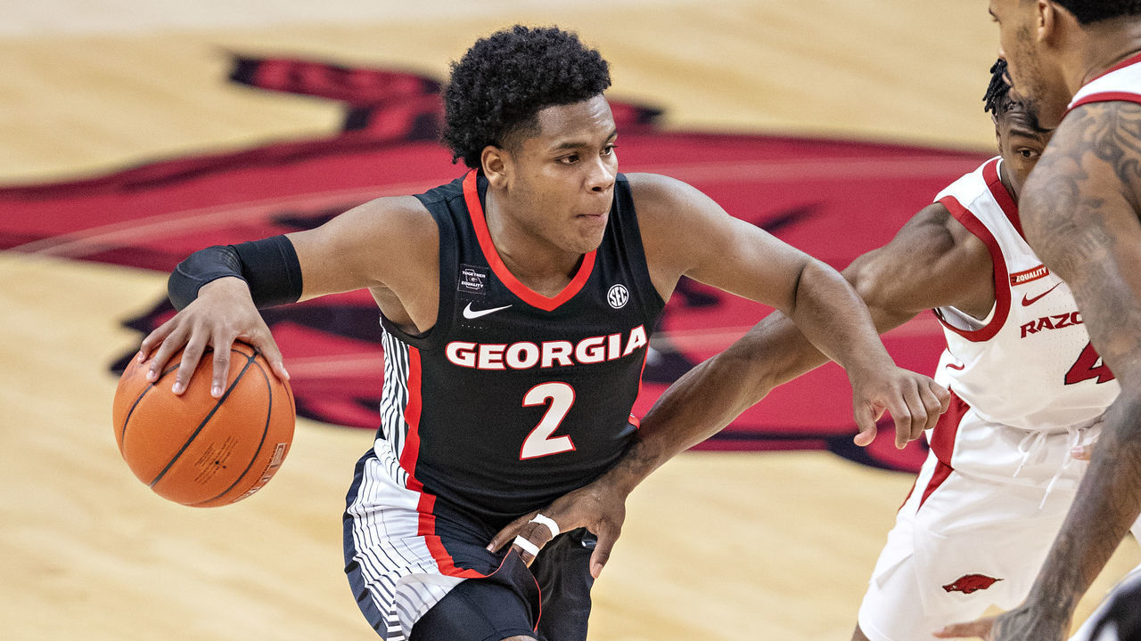 FAYETTEVILLE, ARKANSAS - JANUARY 09: Sahvir Wheeler #2 of the Georgia Bulldogs drives to the middle during a game against the Arkansas Razorbacks at Bud Walton Arena on January 09, 2021 in Fayetteville, Arkansas. The Razorbacks defeated the Bulldogs 69"u201399.