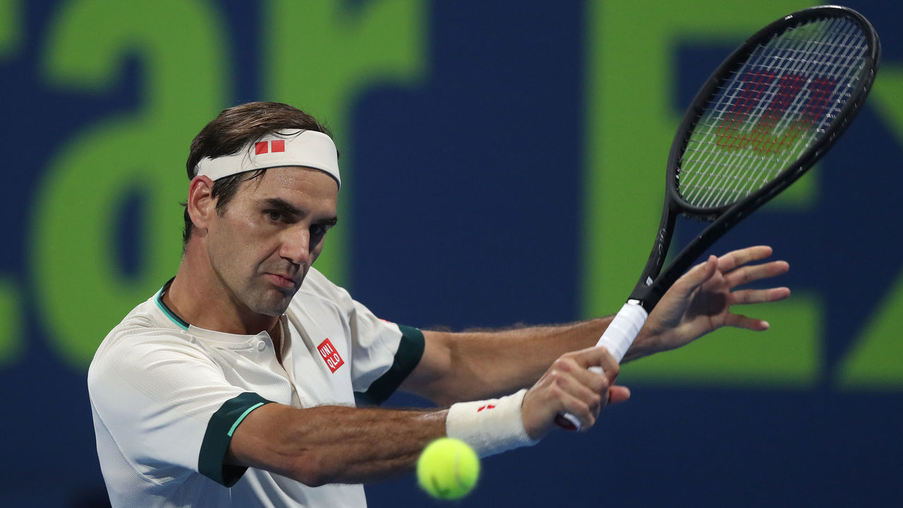DOHA, QATAR - MARCH 11: Roger Federer of Switzerland plays a backhand during his quarter final match with Nikoloz Basilashvili of Georgia in the Qatar ExxonMobil Open at Khalifa International Tennis and Squash Complex on March 11, 2021 in Doha, Qatar.
