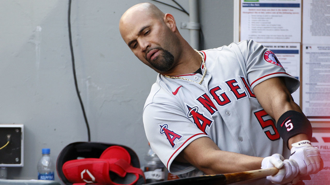 SEATTLE, WASHINGTON - MAY 02: Albert Pujols #5 of the Los Angeles Angels swings his bat in the dugout during the game against the Seattle Mariners at T-Mobile Park on May 02, 2021 in Seattle, Washington.