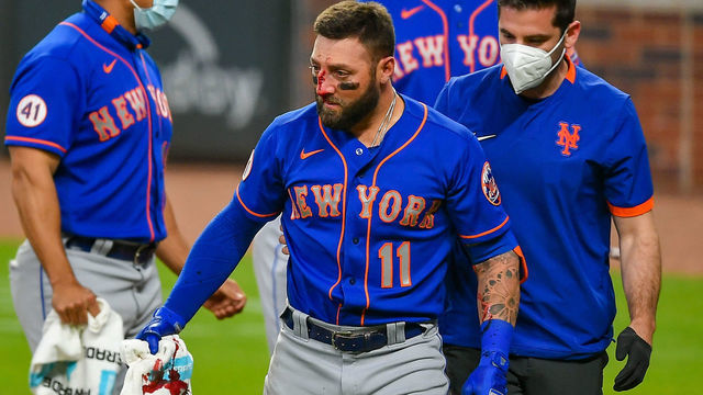 ATLANTA, GA MAY 17: New York center fielder Kevin Pillar (11) walks off the field after being hit by a pitch in the face during the MLB game between the New York Mets and the Atlanta Braves on May 17th, 2021 at Truist Park in Atlanta, GA.