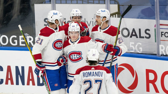 TORONTO, ON - MAY 6: Cole Caufield #22 of the Montreal Canadiens celebrates his goal against the Toronto Maple Leafs with teammates Eric Staal #21, Corey Perry #94, Jon Merrill #28 and Alexander Romanov #27 during the second period at the Scotiabank Arena on May 6, 2021 in Toronto, Ontario, Canada.