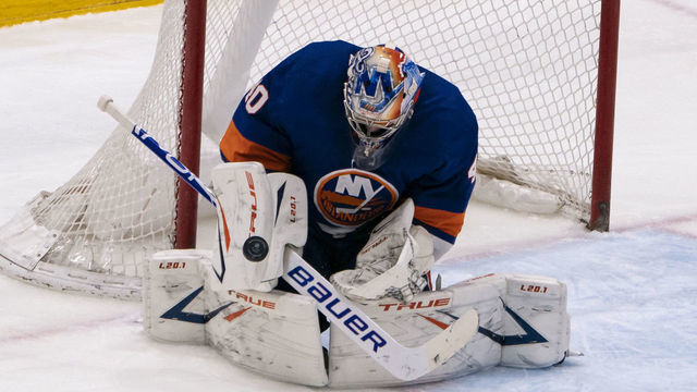 UNIONDALE, NY - APRIL 22: New York Islanders Goalie Semyon Varlamov (40) makes a pad save during the third period of the National Hockey League game between the Washington Capitals and the New York Islanders on April 22, 2021, at the Nassau Veterans Memorial Coliseum in Uniondale, NY.