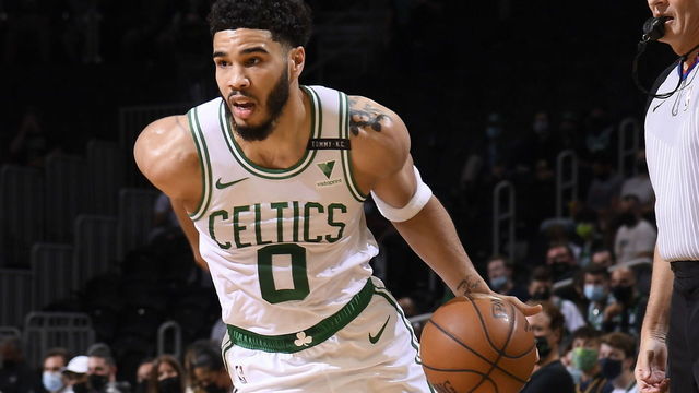 BOSTON, MA - MAY 18: Jayson Tatum #0 of the Boston Celtics dribbles the ball during the game against the Washington Wizards during the 2021 NBA Play-In Tournament on May 18, 2021 at the TD Garden in Boston, Massachusetts. Mandatory Copyright Notice: Copyright 2021 NBAE