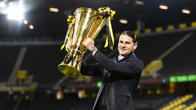 BERN, SWITZERLAND - MAY 15: Head Coach Gerardo Seoane of Young Boys rise up the 2021 trophy after conquering the Swiss Super League Championship at Stadion Wankdorf on May 15, 2021 in Bern, Switzerland.