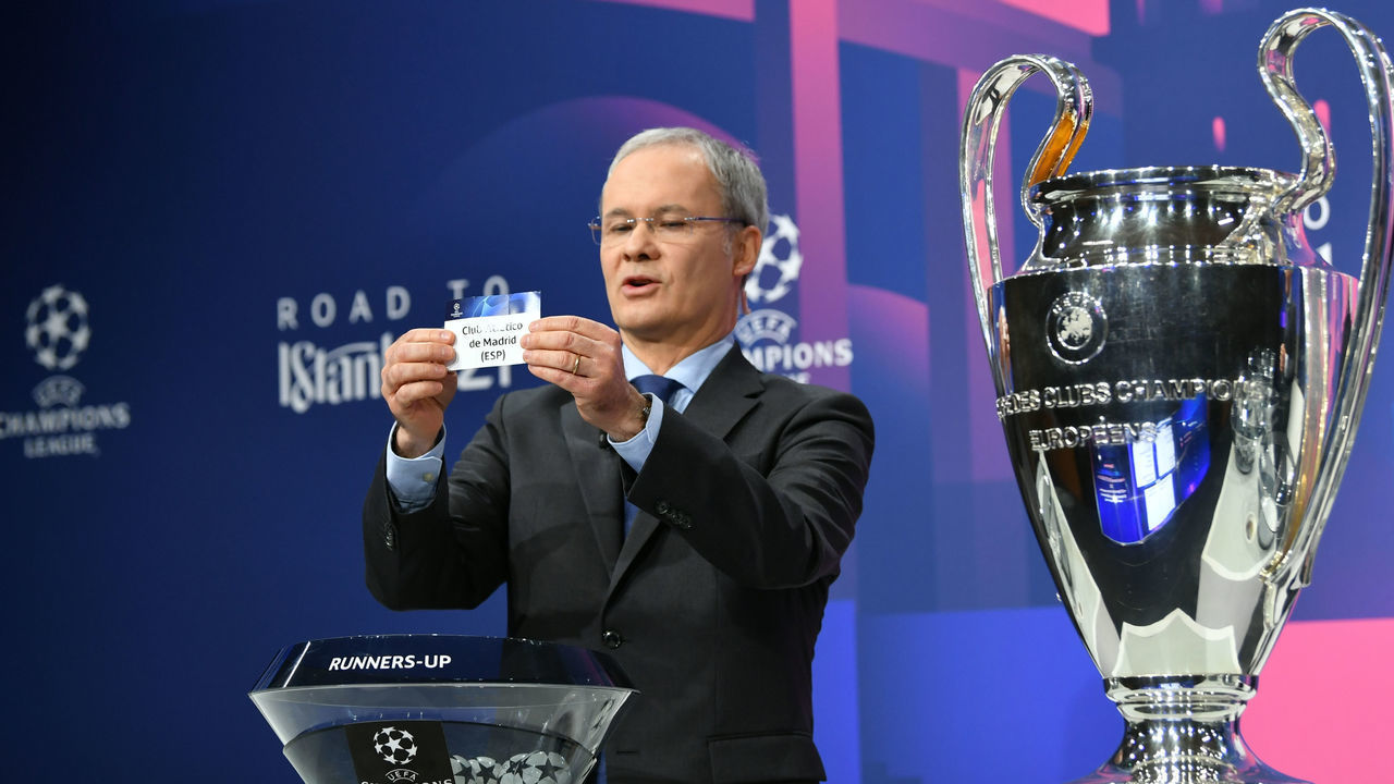 NYON, SWITZERLAND - DECEMBER 14: UEFA Deputy General Secretary Giorgio Marchetti draws out the card of Club Atlético de Madrid during the UEFA Champions League 2020/21 Round of 16 draw at the UEFA Headquarters, the House of European Football, on December 14, 2020, in Nyon, Switzerland