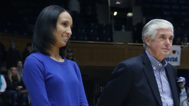 DURHAM, NC - DECEMBER 29: Duke head coach Joanne P. McCallie (right), with athletic director Kevin White and Deputy Director of Athletics Nina King, is honored after winning her 600th game as a head coach during the Duke Blue Devils game versus the Liberty Flames on December 29, 2017, at Cameron Indoor Stadium in Durham, NC.