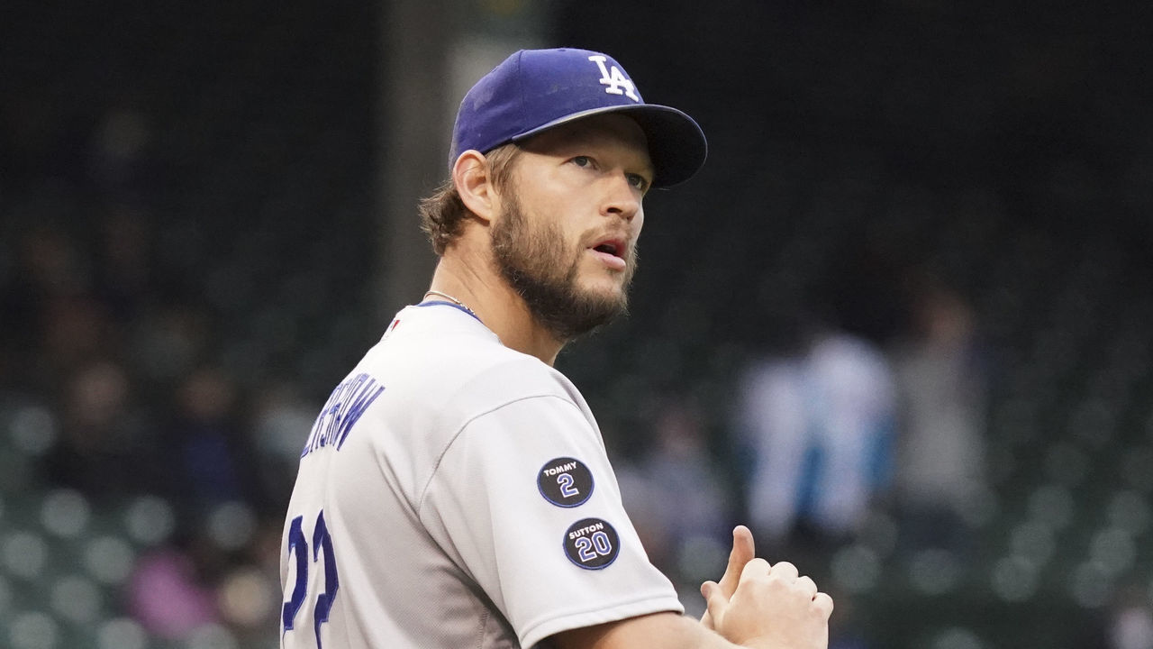 CHICAGO, ILLINOIS - MAY 04: Clayton Kershaw #22 of the Los Angeles Dodgers throws a pitch during the first inning of game 1 of a doubleheader against the Chicago Cubs at Wrigley Field on May 04, 2021 in Chicago, Illinois.