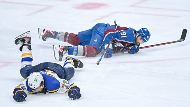 DENVER, CO - MAY 19: St. Louis Blues defenseman Justin Faulk (72) and Colorado Avalanche center Nazem Kadri (91) collide in the third period on a play that would result in a match penalty in the third period during a Stanley Cup Playoffs first round game between the St. Louis Blues and the Colorado Avalanche at Ball Arena in Denver, Colorado on May 19, 2021.