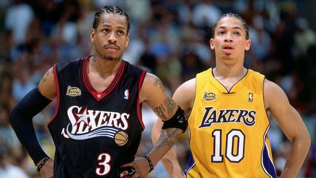 LOS ANGELES - JUNE 6: Allen Iverson #3 of the Philadelphia 76ers stands with Tyronn Lue #10 of the Los Angeles Lakers during game one of the 2001 NBA Finals played June 6, 2001 at the Staples Center in Los Angeles, California. NOTE TO USER: User expressly acknowledges that, by downloading and or using this photograph, User is consenting to the terms and conditions of the Getty Images License agreement. Mandatory Copyright Notice: Copyright 2001 NBAE