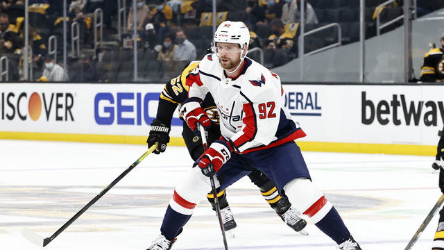 BOSTON, MA - MAY 19: Washington Capitals center Evgeny Kuznetsov (92) looks to the wing during Game 3 of the NHL Stanley Cup Playoffs First Round between the Boston Bruins and the Washington Capitals on May 19, 2021, at TD Garden in Boston, Massachusetts.
