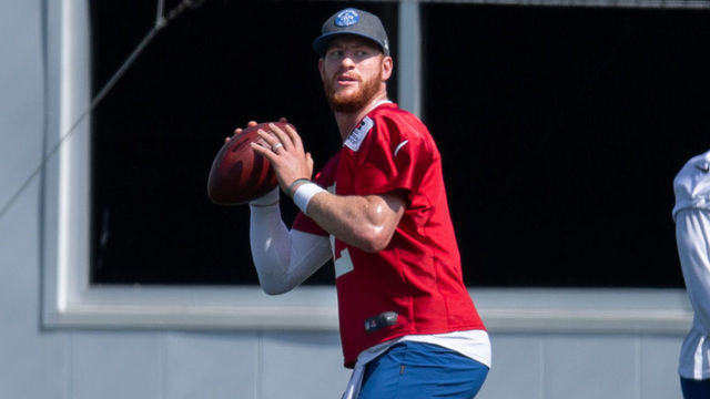 INDIANAPOLIS, IN - MAY 20: Indianapolis Colts quarterback Carson Wentz (2) runs through a drill during the Indianapolis Colts offseason practice on May 20, 2021 at the Indiana Farm Bureau Football Center in Indianapolis, IN.