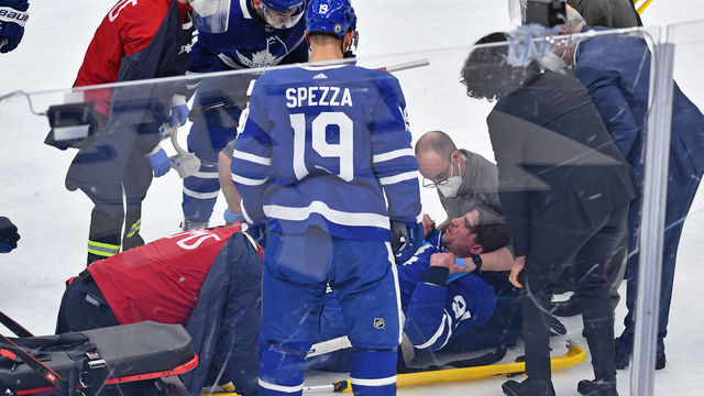 TORONTO, ON - MAY 20: Toronto Maple Leafs Center John Tavares (91) is loaded onto a stretcher after being injured during game one of the NHL Stanley Cup Playoffs First Round between the Montreal Canadiens and Toronto Maple Leafs on May 20, 2021 at Scotiabank Arena in Toronto, ON.
