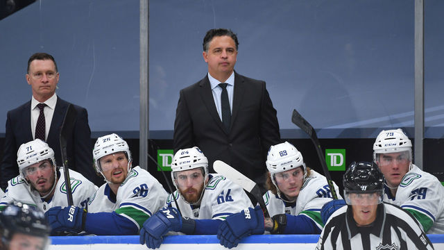 EDMONTON, ALBERTA - JULY 29: Head Coach Travis Green of the Vancouver Canucks looks on from the bench during the first period of an exhibition game against the Winnipeg Jets prior to the 2020 NHL Stanley Cup Playoffs at Rogers Place on July 29, 2020 in Edmonton, Alberta.