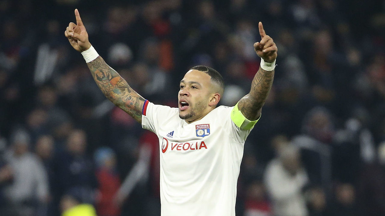 LYON, FRANCE - DECEMBER 10: Memphis Depay of Lyon celebrates his goal tying the game at 2-2 during the UEFA Champions League group G match between Olympique Lyonnais (OL, Lyon) and RB Leipzig at Groupama Stadium on December 10, 2019 in Lyon, France.