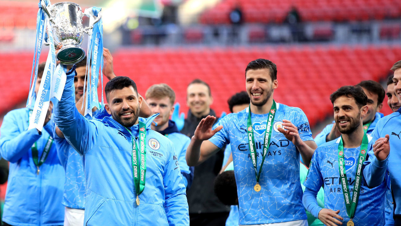 Manchester City's Sergio Aguero celebrates with the trophy after winning the Carabao Cup Final at Wembley Stadium, London. Picture date: Sunday April 25, 2021.
