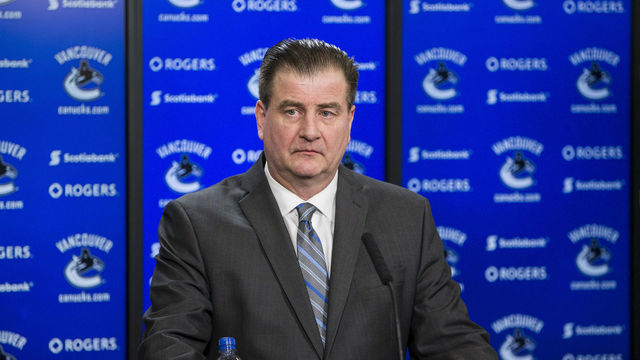 VANCOUVER, BC - FEBRUARY 28: Vancouver Canucks General Manager Jim Benning speaks to the media after a game between against the Vancouver Canucks and Detroit Red Wings. Benning was discussing the recent trades of Vancouver Canucks Left Wing Alexandre Burrows (14) and Vancouver Canucks Right Wing Jannik Hansen (36). February 28, 2017, at Rogers Arena in Vancouver, BC.
