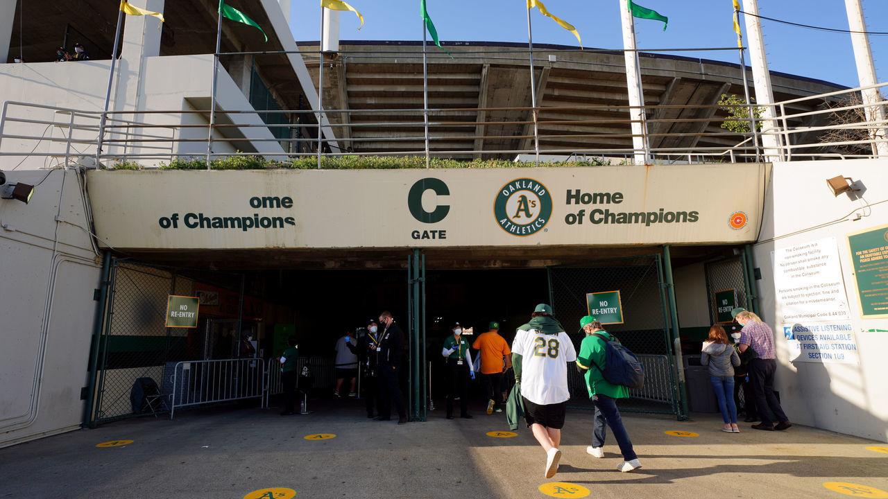 OAKLAND, CA - APRIL 01: Fans are seen entering Oakland Coliseum prior to the game between the Houston Astros and the Oakland Athletics at Oakland Coliseum on Thursday, April 1, 2021 in Oakland, California.