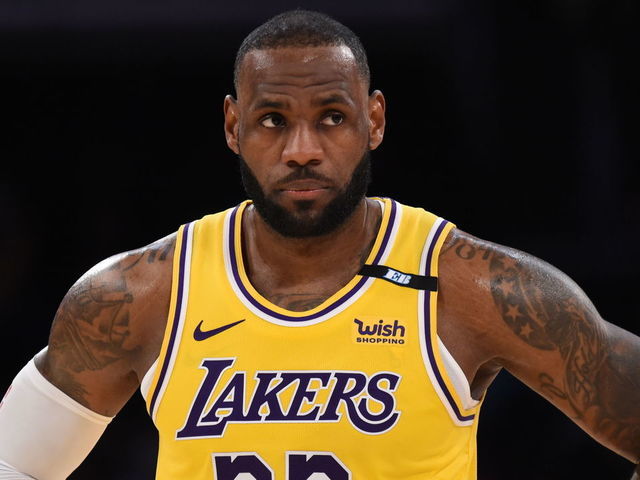LOS ANGELES, CA - MAY 19: LeBron James #23 of the Los Angeles Lakers looks on during the game against the Golden State Warriors during the 2021 NBA Play-In Tournament on May 19, 2021 at STAPLES Center in Los Angeles, California. NOTE TO USER: User expressly acknowledges and agrees that, by downloading and/or using this Photograph, user is consenting to the terms and conditions of the Getty Images License Agreement. Mandatory Copyright Notice: Copyright 2021 NBAE