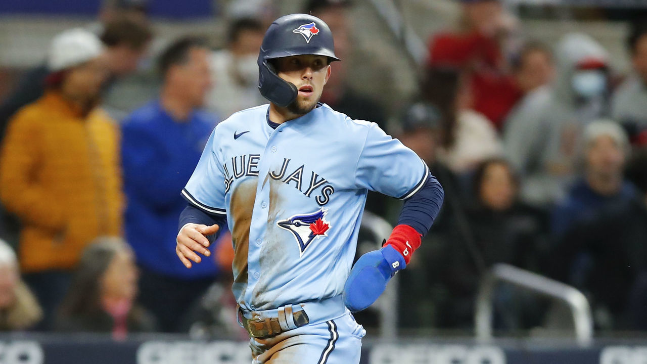 ATLANTA, GA - MAY 12: Cavan Biggio #8 of the Toronto Blue Jays scores on a Marcus Semien double in the sixth inning against the Atlanta Braves at Truist Park on May 12, 2021 in Atlanta, Georgia.