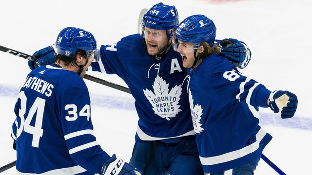 TORONTO, ON - MAY 22: William Nylander #88 of the Toronto Maple Leafs celebrates his goal against the Montreal Canadiens with teammates Auston Matthews #34 and Morgan Rielly #44 during the third period in Game Two of the First Round of the 2021 Stanley Cup Playoffs at the Scotiabank Arena on May 22, 2021 in Toronto, Ontario, Canada.