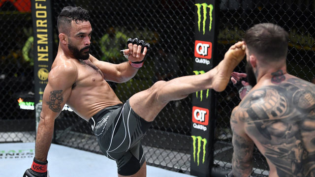 LAS VEGAS, NEVADA - MAY 22: (L-R) Rob Font kicks Cody Garbrandt in their bantamweight bout during the UFC Fight Night event at UFC APEX on May 22, 2021 in Las Vegas, Nevada.