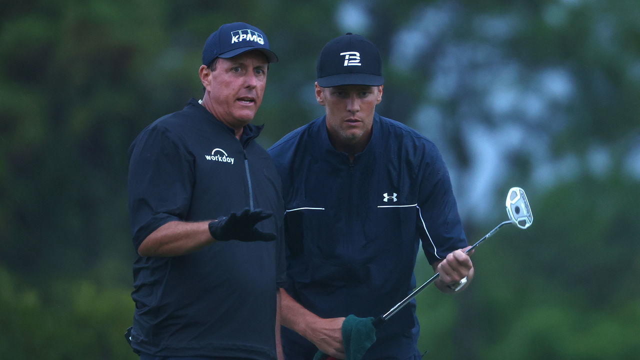 HOBE SOUND, FLORIDA - MAY 24: Phil Mickelson reads a putt for NFL player Tom Brady of the Tampa Bay Buccaneers on the 17th green during The Match: Champions For Charity at Medalist Golf Club on May 24, 2020 in Hobe Sound, Florida.