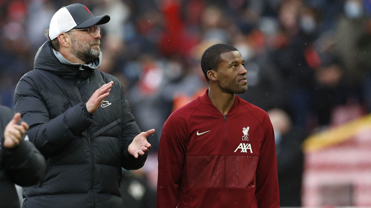 Liverpool's Georginio Wijnaldum with manager Jurgen Klopp during a lap of honour after the Premier League match at Anfield, Liverpool. Picture date: Sunday May 23, 2021.