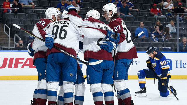 ST. LOUIS, MO - MAY 23: Gabriel Landeskog #92 of the Colorado Avalanche is congratulated by teammates after scoring a goal against the St. Louis Blues in Game Four of the First Round of the 2021 Stanley Cup Playoffs at the Enterprise Center on May 23, 2021 in St. Louis, Missouri.