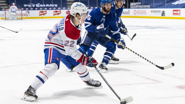 TORONTO, ON - MAY 8: Cole Caufield #22 of the Montreal Canadiens plays the puck against the Toronto Maple Leafs during the second period at the Scotiabank Arena on May 8, 2021 in Toronto, Ontario, Canada.