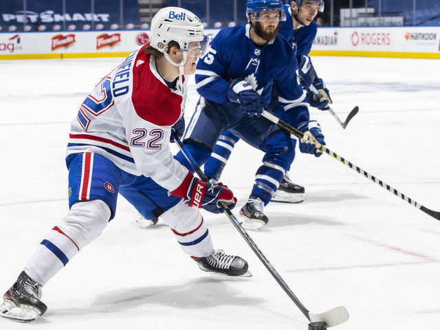 TORONTO, ON - MAY 8: Cole Caufield #22 of the Montreal Canadiens plays the puck against the Toronto Maple Leafs during the second period at the Scotiabank Arena on May 8, 2021 in Toronto, Ontario, Canada.