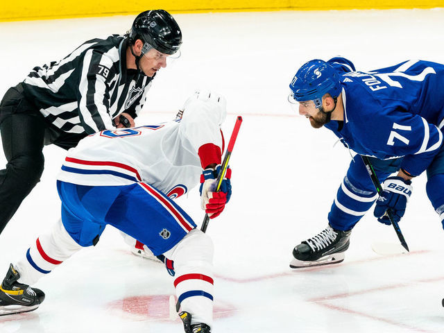 TORONTO, ON - MAY 22: Nick Foligno #71 of the Toronto Maple Leafs takes a face off against Jesperi Kotkaniemi #15 of the Montreal Canadiens during the third period in Game Two of the First Round of the 2021 Stanley Cup Playoffs at the Scotiabank Arena on May 22, 2021 in Toronto, Ontario, Canada.