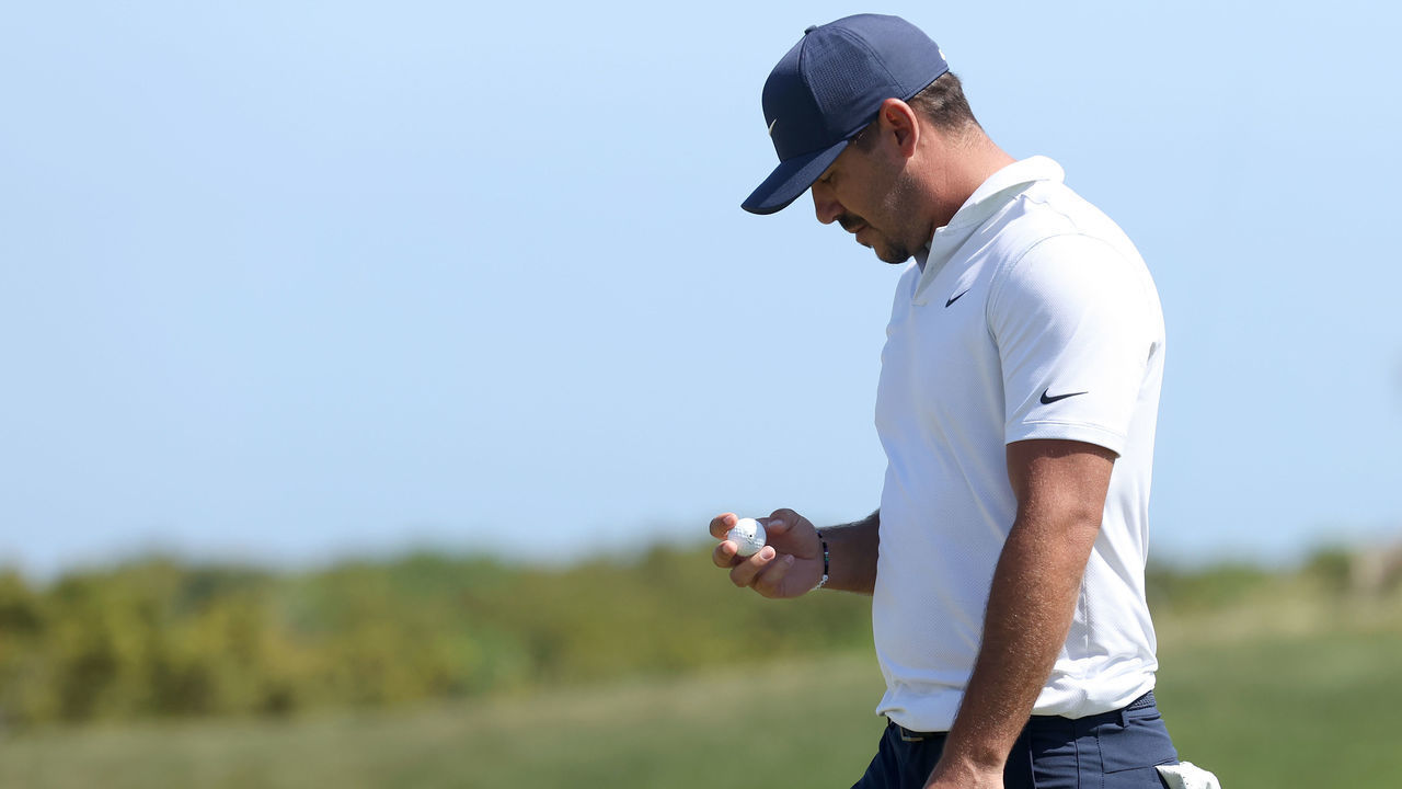 KIAWAH ISLAND, SOUTH CAROLINA - MAY 21: Brooks Koepka of the United States looks at his ball on the sixth green during the second round of the 2021 PGA Championship at Kiawah Island Resort's Ocean Course on May 21, 2021 in Kiawah Island, South Carolina.