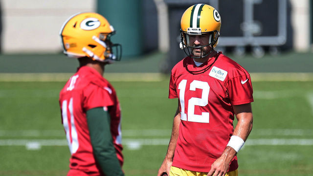 ASHWAUBENON, WISCONSIN - AUGUST 17: Aaron Rodgers #12 of the Green Bay Packers and Jordan Love #10 participate in work outs during training camp at Ray Nitschke Field on August 17, 2020 in Ashwaubenon, Wisconsin.